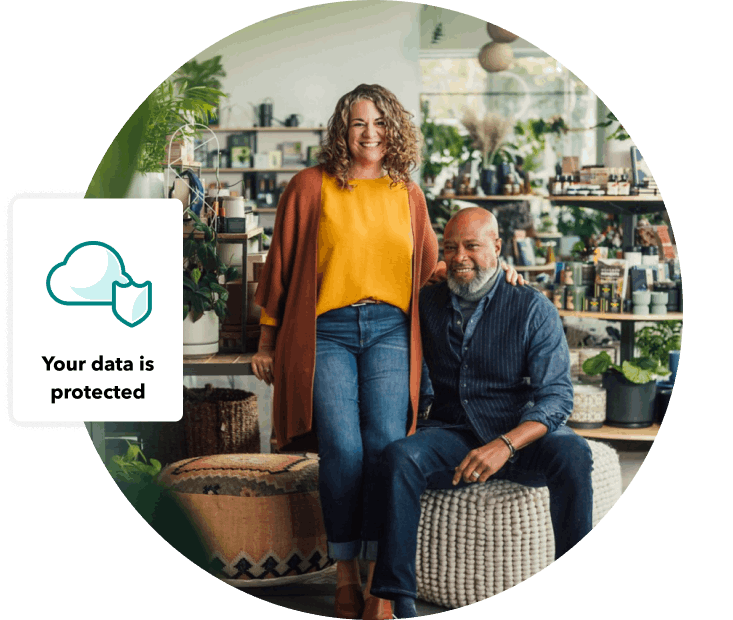 Two owners of Ecovibe, a plant nursery, inside their retail store. A collage with a cloud and shield icon for data protection.  