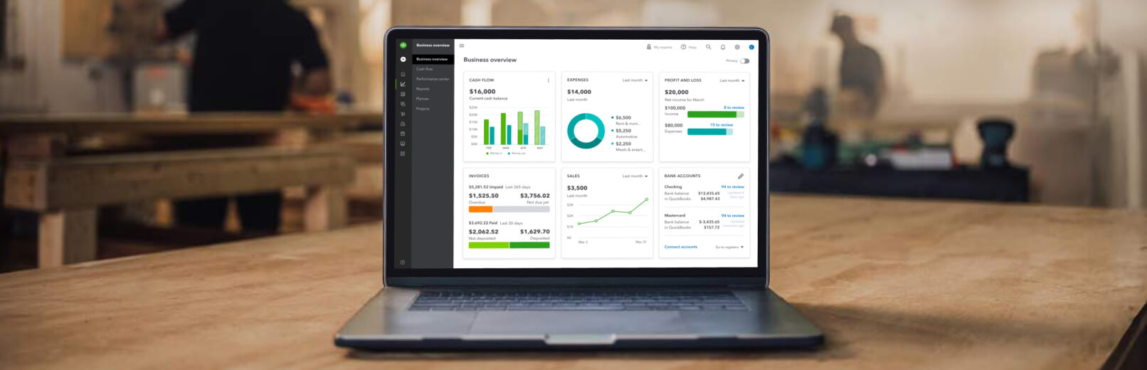 Laptop on a workshop table and snapshot of dashboard