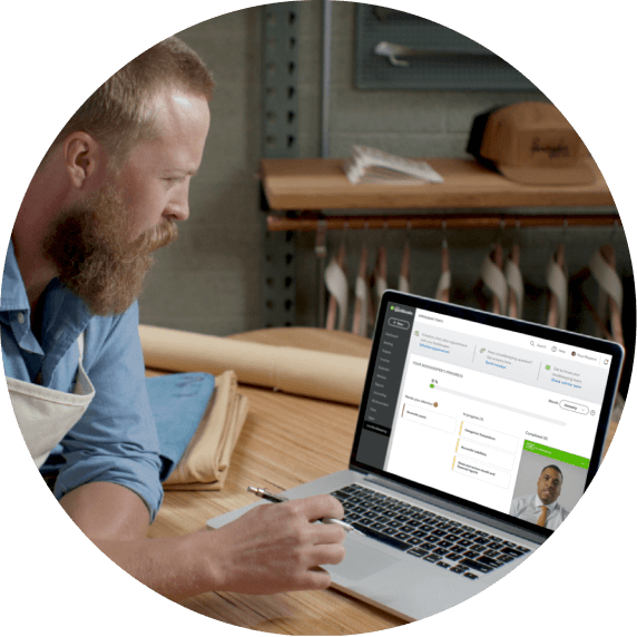 Small business owner working with online bookkeeper on laptop. Screenshot from QuickBooks Live - Expert bookkeeping video
