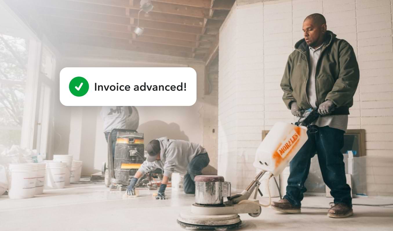 Worker sanding floors and a message reading "Success! Invoice advanced."
