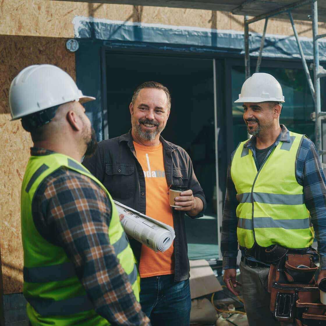 People talking on a construction site