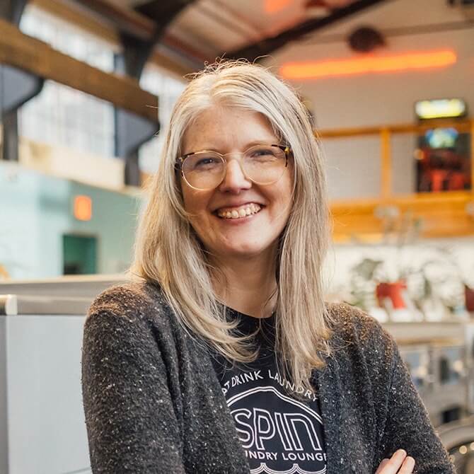 Portrait of a woman standing in her business