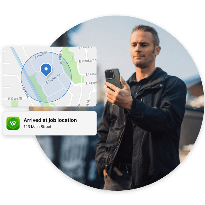 An employee checks his phone with an overlay image of a map and app notification that he has arrived at the job location.