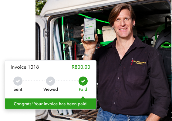 Business owner showing invoice has been paid on QuickBooks mobile app