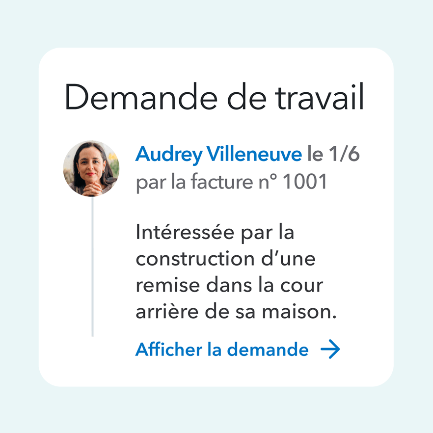 Black and white photograph of a person on a computer.